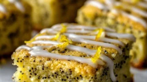 Baked lemon poppy seed bars, a delightful and zesty dessert treat