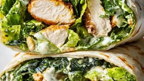 Healthy Chicken Caesar Wraps with grilled chicken, romaine lettuce, and Caesar dressing