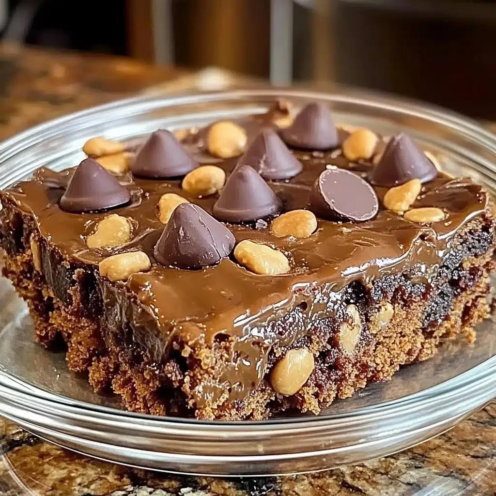 Delicious Peanut Butter Cup Dump Cake topped with chocolate and peanut butter
