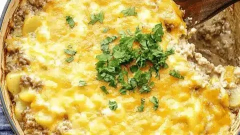 Cheesy hamburger casserole with potatoes baked to perfection for a delicious meal.