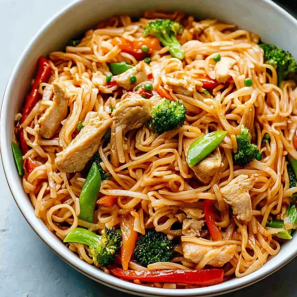 Delicious rice noodle stir-fry with fresh vegetables and vibrant flavors