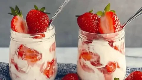 Fresh strawberries served with cream, a delightful summer dessert
