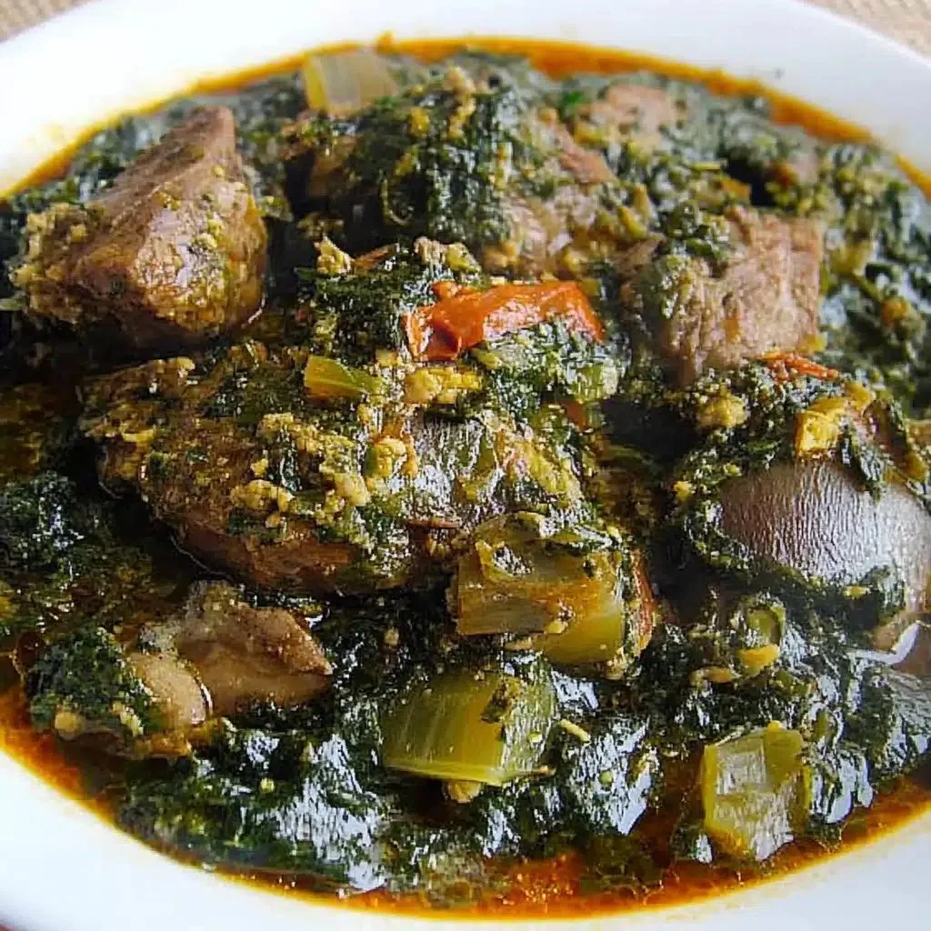 Bowl of authentic Afang Soup, a bold Nigerian vegetable dish with rich flavors.