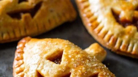 Jack O' Lantern hand pies decorated for Halloween