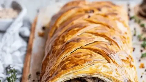 Delicious Vegan Mushroom Wellington served on a cozy dining table