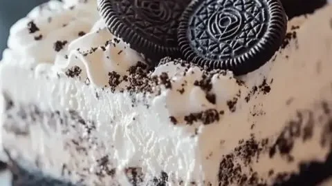 No Bake Heavenly Oreo Dessert with layers of cookies and cream