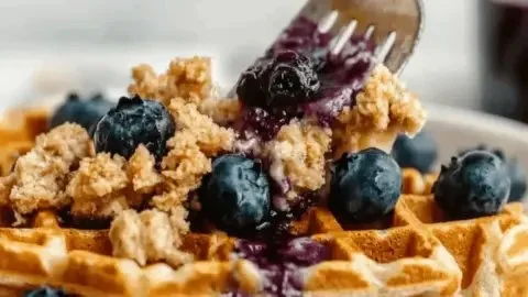Overnight blueberry waffle casserole baked with fresh blueberries and waffle pieces