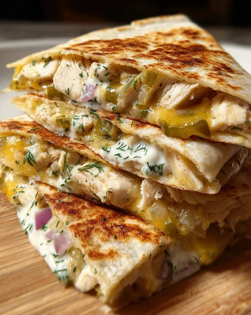 Delicious pickle-brined chicken quesadillas served on a plate.