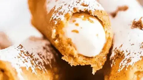 Delicious pumpkin spice cannoli served on a plate for fall dessert