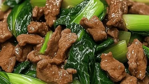 Bok choy stir-fried beef dish served in a bowl with vegetables
