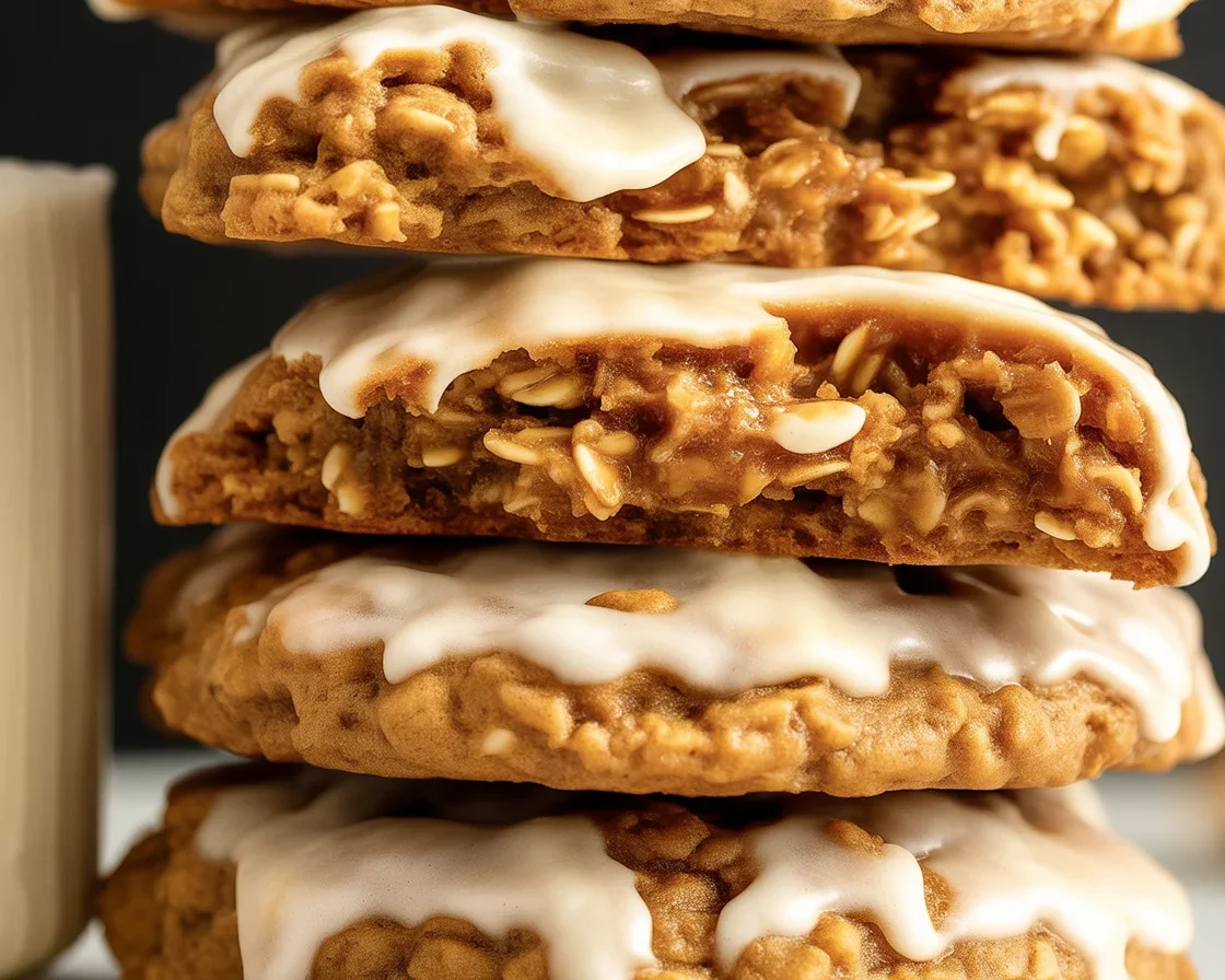 Delicious chai oatmeal cookies topped with maple glaze, showcasing a thick and chewy texture.