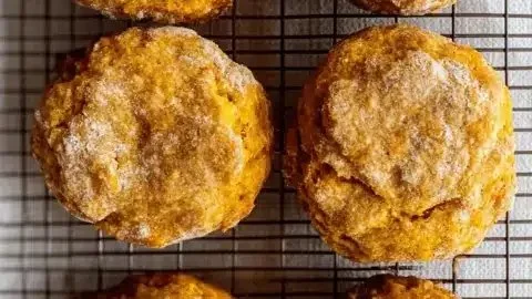 Freshly baked spiced butternut squash biscuits on a holiday table