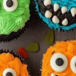 Spooky Halloween Monster Cupcakes decorated for a fun family baking experience