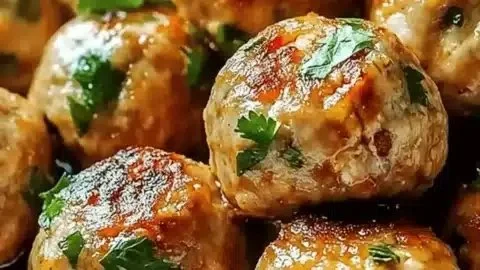 Zesty Thai baked chicken meatballs served with peanut sauce