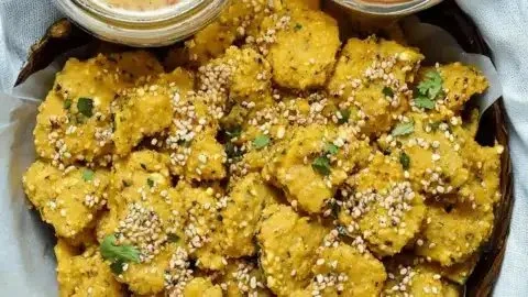 Delicious Zucchini Methi Muthias served on a plate, a healthy Indian snack option.