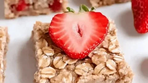 Healthy strawberry oatmeal bars on a plate, eggless and delicious