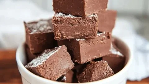 Delicious and healthy 2-ingredient fudge on a wooden table