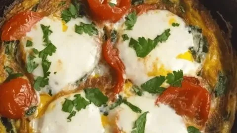 Delicious Afghani omelette served with fresh herbs and vegetables for breakfast