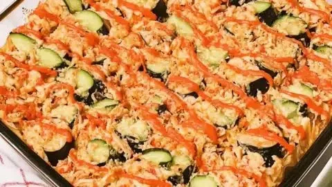 Deliciously baked sushi bake ready to serve at a dinner party