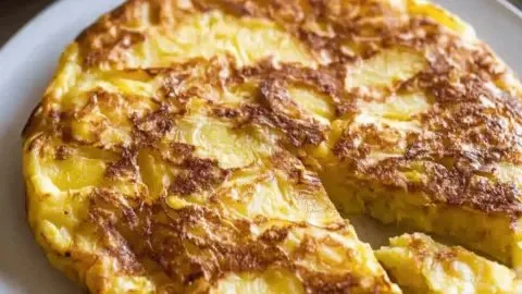 Delicious Potato Omelette, a savory Spanish dish made with eggs and potatoes.