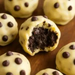 No-bake chocolate chip cookie dough brownie bombs on a plate