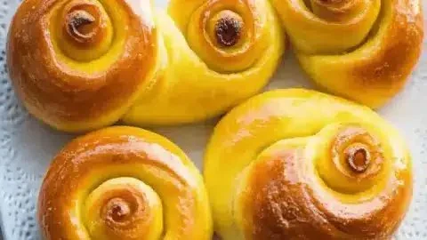 Freshly baked St. Lucia saffron buns ready to be enjoyed.