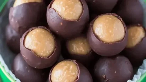 Homemade peanut butter balls on a plate, perfect no-bake dessert