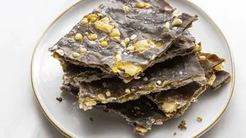 Delicious Matzo Crack topped with chocolate and nuts, perfect snack treat.