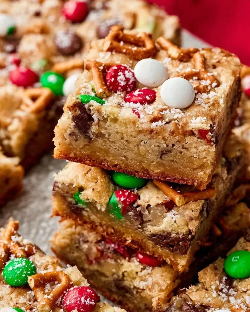 Delicious Santa's Trash Cookie Bars with festive toppings and colorful sprinkles.
