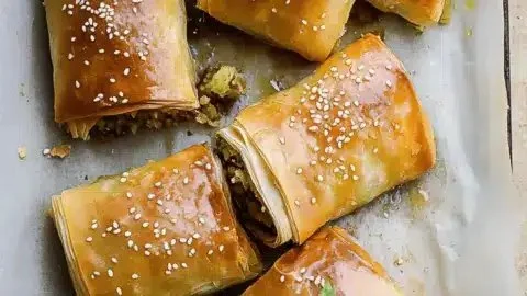 Savory bobotie filo parcels baked to perfection, ideal for a cozy dinner.