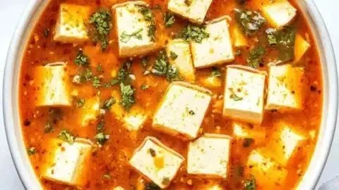 Quick spicy silken tofu stir-fry with vibrant vegetables and aromatic spices