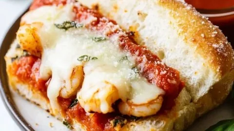 Baked Shrimp Parmesan Hero sandwich with shrimp, cheese, and Italian herbs