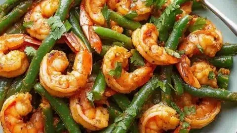 Bangladeshi spiced shrimp stir-fry with green beans for a comforting dish