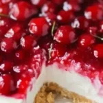 No-bake old-fashioned cherry cheesecake topped with cherries and cream