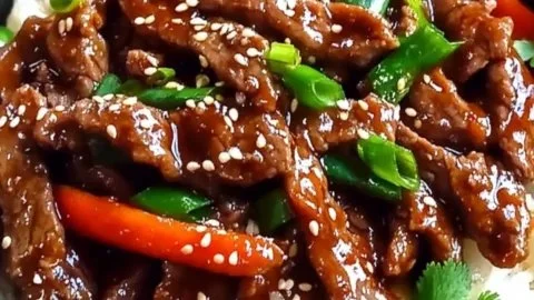 Delicious ginger beef stir-fry served in a bowl with vegetables
